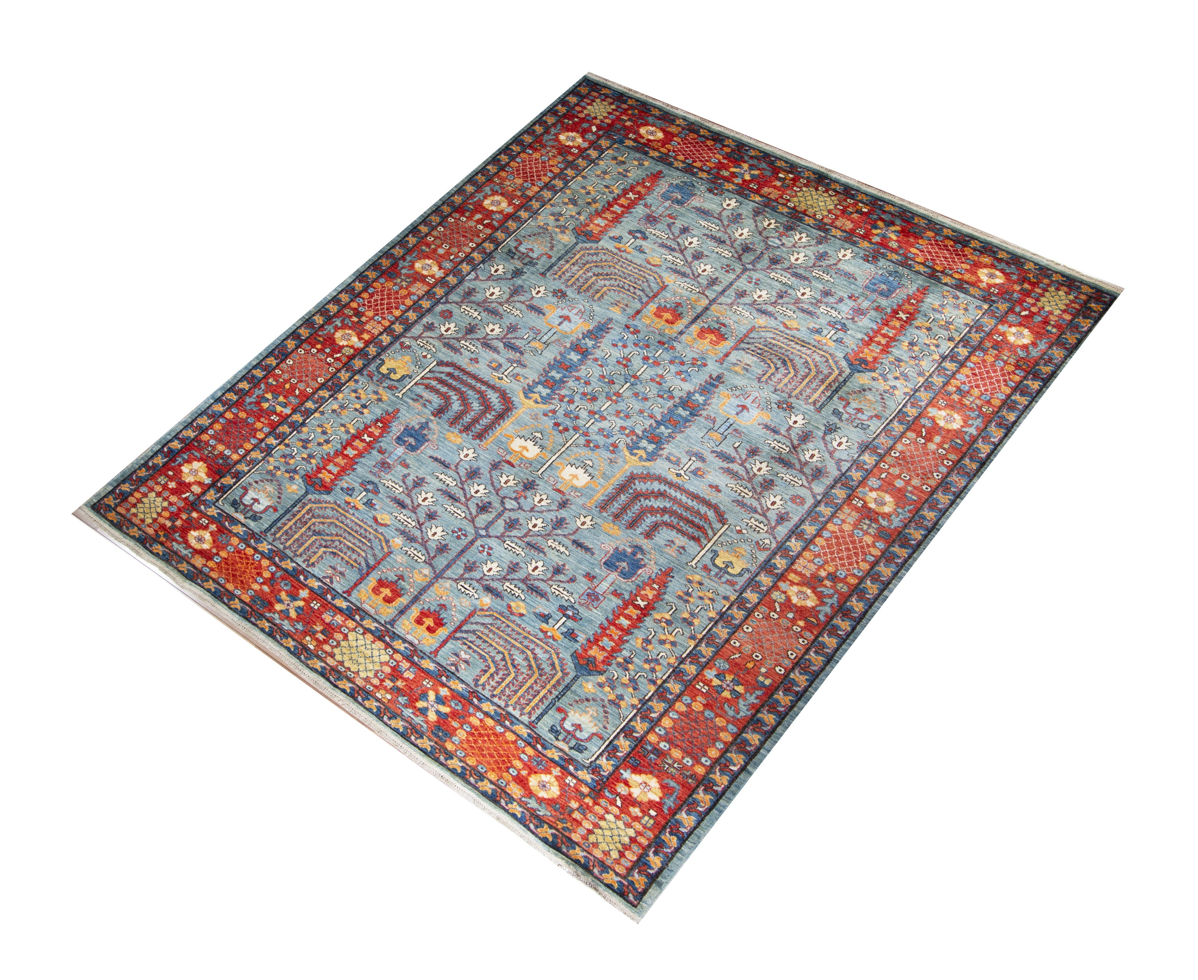 Seljuk Wool Hand Knotted Pakistani Rug, featuring Blue tones and Floral design, ideal area rug for any room in your home.